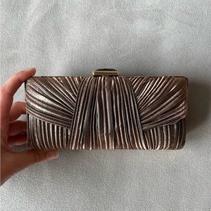 Sondra Robert’s Pleated Clutch